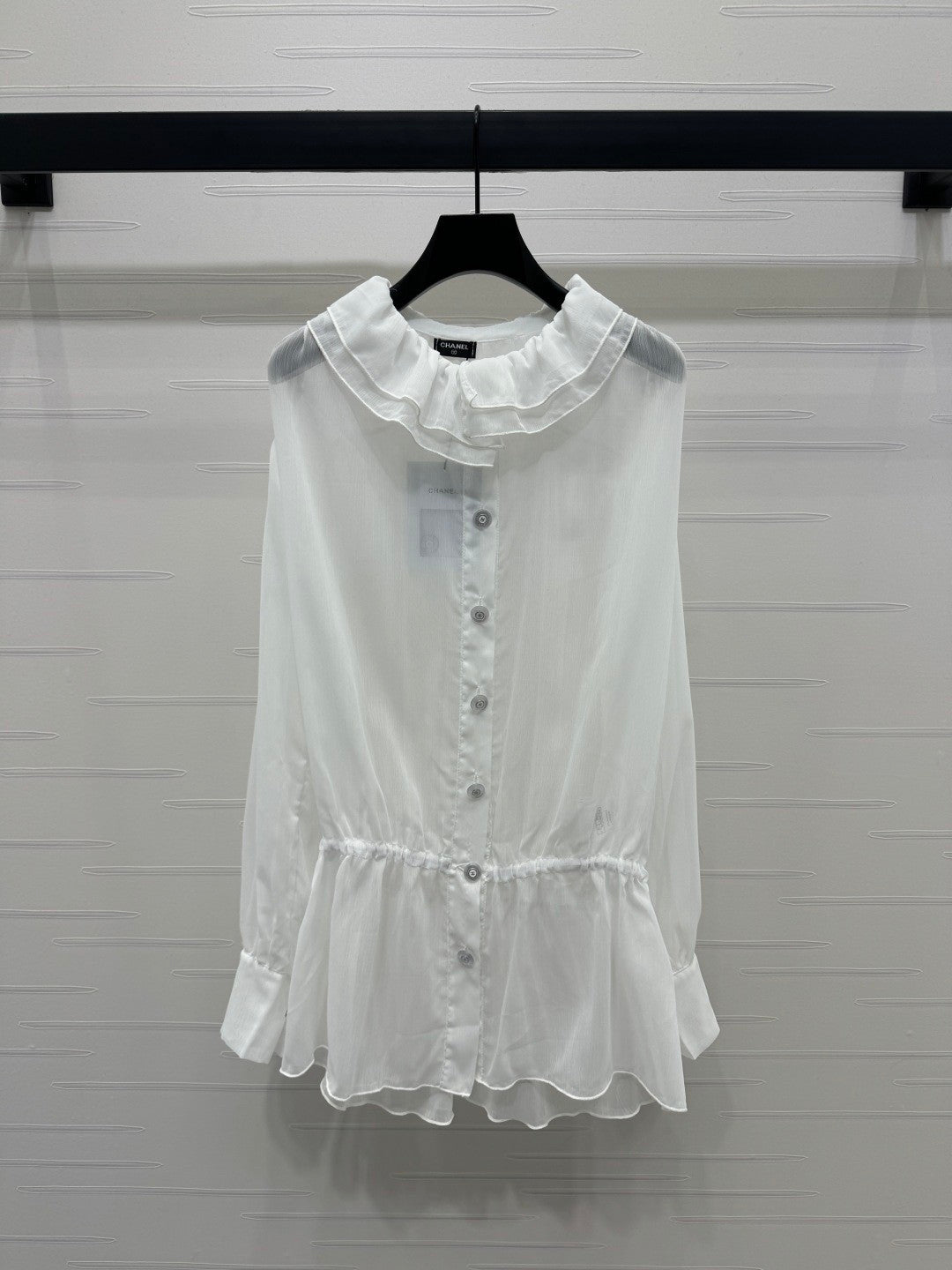 25 Ruffled long sleeved shirt