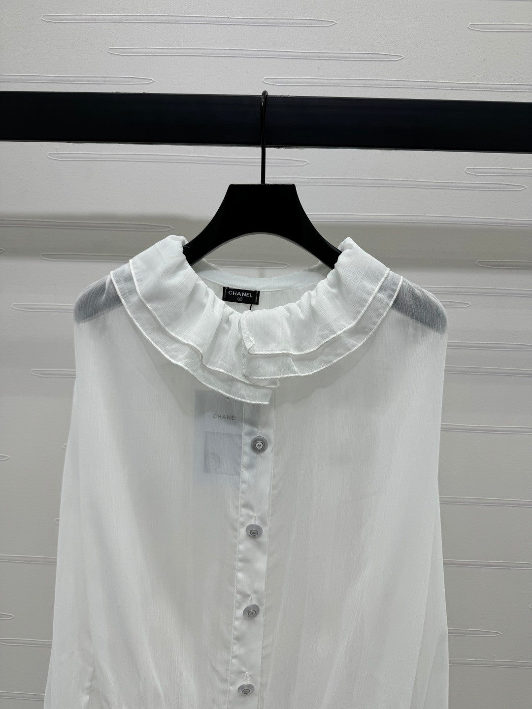 25 Ruffled long sleeved shirt