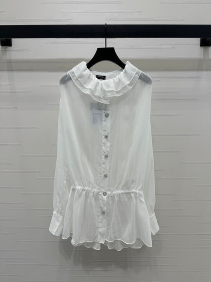 25  Ruffled long sleeved shirt