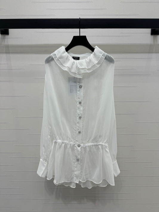 25  Ruffled long sleeved shirt