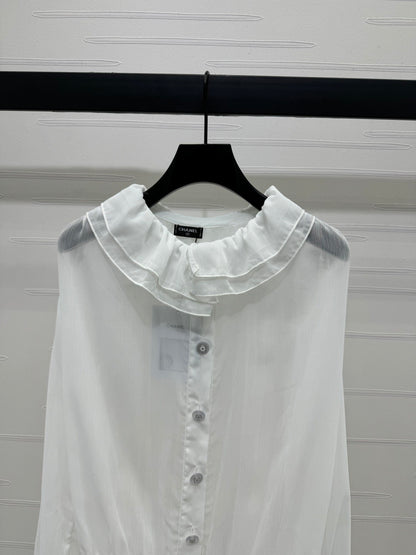 25  Ruffled long sleeved shirt