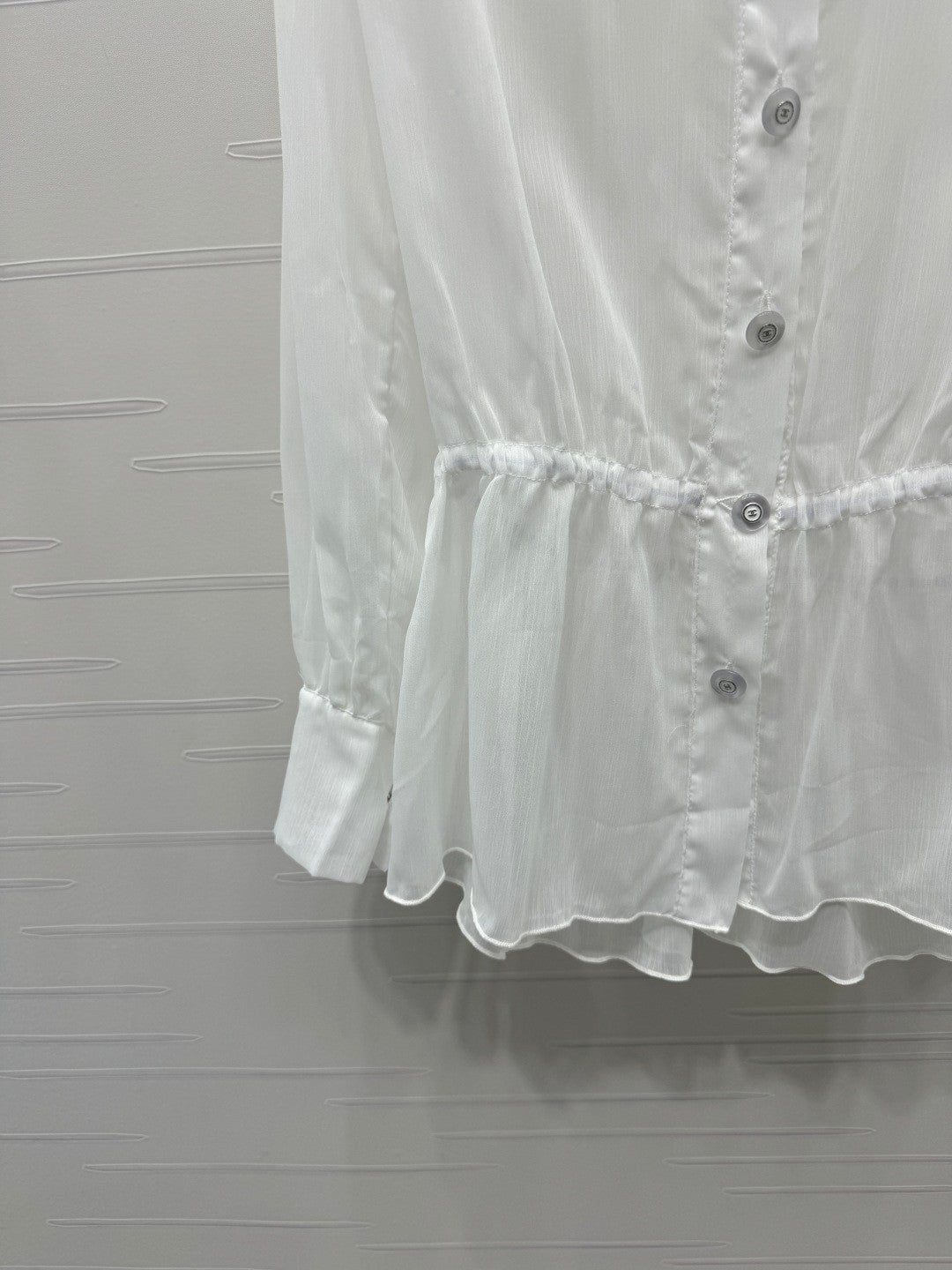 25  Ruffled long sleeved shirt