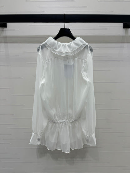 25  Ruffled long sleeved shirt