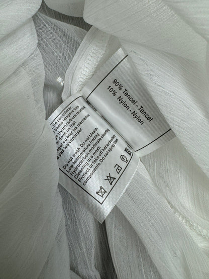 25  Ruffled long sleeved shirt